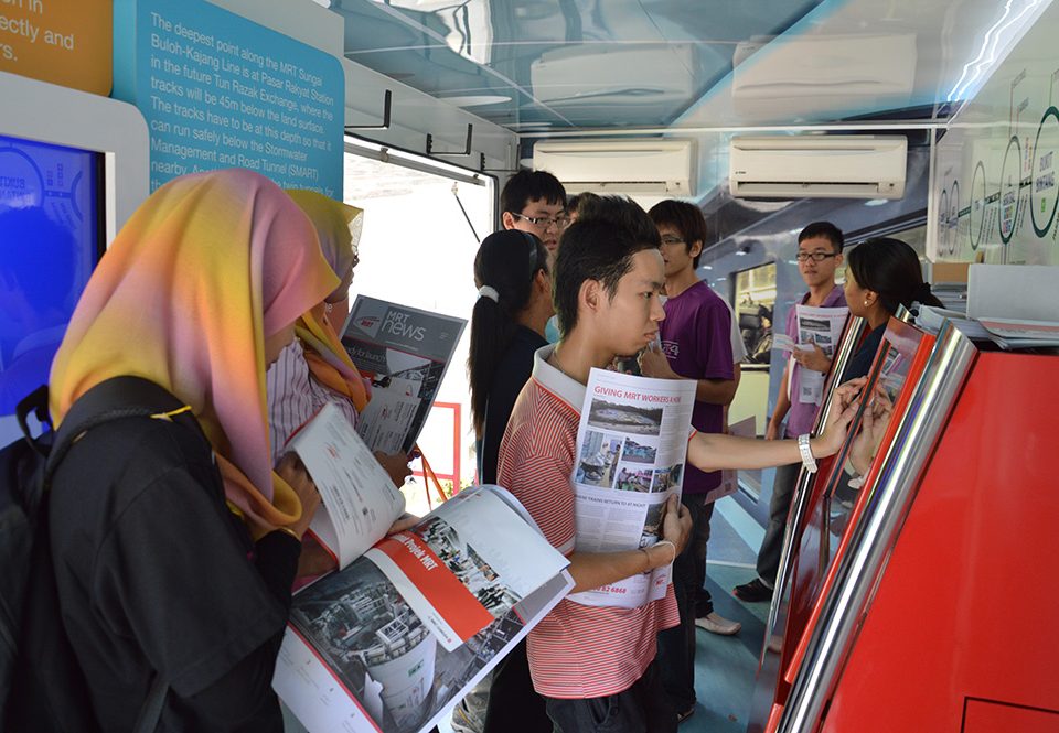 GETTING INFORMED: Students learning about the MRT Sungai Buloh-Kajang Line inside the MRT Information Truck.