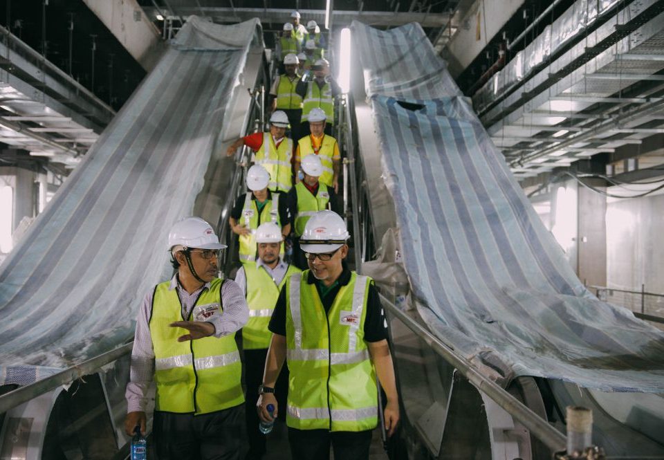 LEADING THE WAY: The Royal Institution of Surveyors of Malaysia (RISM) Geomatic and Land Surveying Division Vice President Dato Sr Mohd Noor Isa (left) with Malaysia Rapid Transit Corporation (MRT Corp) Commercial and Land Management Director Dato Haris Fadzilah Hassan (right) leading the delegates through Cochrane Station.