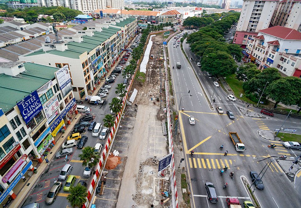 View facing south-bound of the site of the future Metro Prima Station with site clearing, piloting for underground services, soil investigation works and welding of gas pipe in progress.