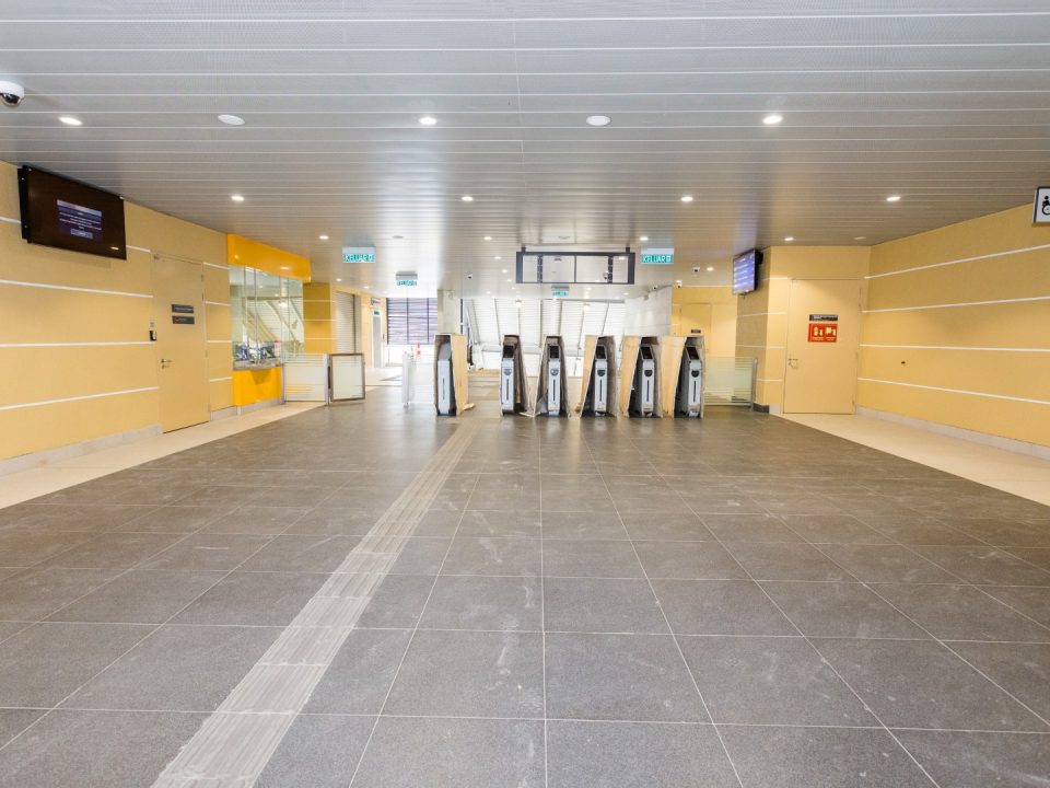 Touch-up of painting works in progress at the unpaid area of the Kentonmen MRT Station.